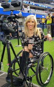 Award-winning Los Angeles sports reporter Maria Serrao, who utilizes a wheelchair, on the field at Sofi Stadium.