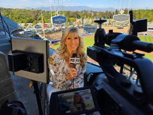 Longtime Los Angeles sports reporter Maria Serrao, who utilizes a wheelchair, at Dodger Stadium.