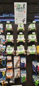 Augie Bones plant-based chew toys proudly displayed at Premier Pet Supply locations across Michigan.