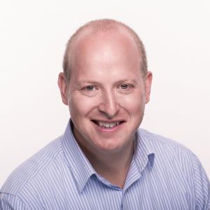Headshot of Neil O'Neill, Chief Operating Officer at SIG