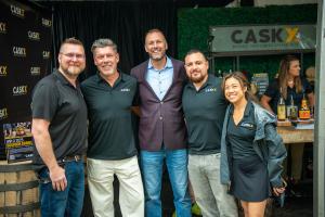 Jeremy Kasler, CEO of CaskX poses with Jade Peterson from Kentucky Artisan Distillery