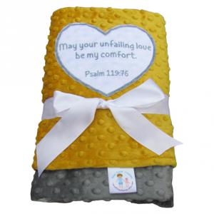 Crib size blanket with ultra soft minky on both sides, and Psalm 119:76 Bible verse applique.  Colors include golden yellow, gray, and white.