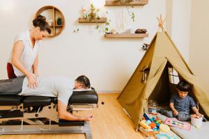 The Shift Chiropractic Oakland office interior showing modern chiropractic treatment rooms and welcoming patient area