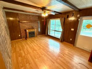 3 BR/1 BA single level brick original owner home on .17 +/- acre lot in the Eastern Heights neighborhood of Martinsburg, WV. This home measures 1,224 +/- sf., and features an eat-in kitchen (all appliances convey); living room w/fireplace; sun room; attic; crawl space