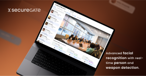 A tilted laptop displaying the SecureGate dashboard, showing a live camera feed of a conference room with attendees and individual identity profiles on the side. The SecureGate logo appears in the top corner, with the tagline 'Advanced facial recognition 