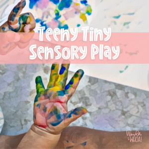 Messy toddler hands in paint with caption Teeny Tiny Sensory Play