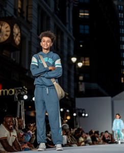 Sam Walker models a blue Converse track suit on the Rookie USA X Macy's Fashion Show in New York City, September 18,2025.