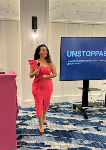 Laura Navaquin speaking on stage