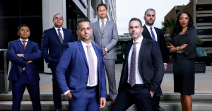 Group photo of the J&Y Law team, attorneys representing a student injured at Tracy Learning Center, pursuing legal action that raises questions about school safety and Carolyn Woods’s leadership