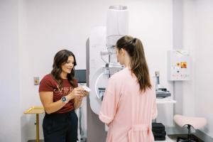 Breast health specialist guiding patient through advanced mammogram at Shero Imaging, St. Louis, Missouri breast cancer screening center.