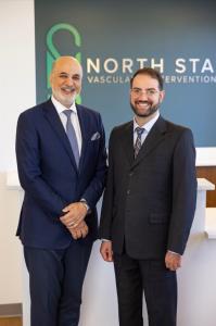 Dr. Golzarian and Dr. Astani stand side by side in their outpatient clinic