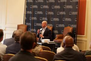 Dr. Chicotsky speaking to a private equity and banking community on monetizing reach.