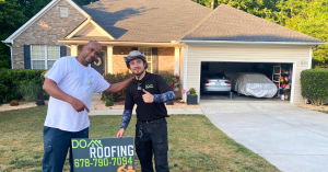 Happy homeowner after shingle roof replacement by Dom Roofing & Restoration in Buford GA