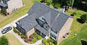 Aerial view of a newly completed shingle roof installation by Dom Roofing & Restoration in Buford Georgia