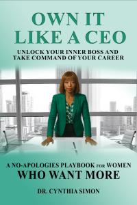 Book cover of “Own It Like a CEO” by Cynthia Simon, featuring a professional woman in a green suit at an office desk.