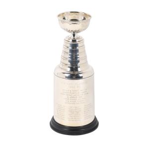 Hockey great Stefan Persson’s player-issued Stanley Cup trophy commemorating the 1982–83 NHL championship season, 13 inches tall, mounted on a wooden base (CA$14,160).