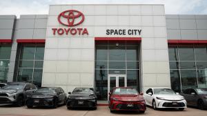 Exterior shot of Space City Toyota, a car dealership in Humble, TX outside of Houston, TX