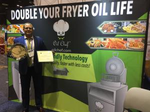 OiL Chef CEO Sean Farry with Award at Restaurant show 2019