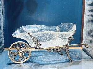 Stunning circa 1907 William Comyns Sons sterling silver 925 and crystal wheelbarrow, 42 cm long. Estimate: $12,000-$15,000.