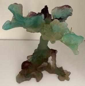 Decorative accessories will feature this Daum pate de verre (opaque, dense glass having a frosted surface) signed three-arm candelabra figurine, made in France Estimate: $1,000-$1,500.