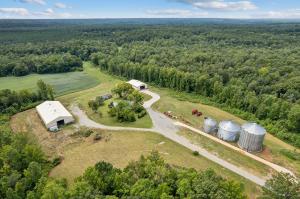 Highlights of the property include frontage on the South Anna River, frontage on Ambler and Shannon Hills Roads, crop land, forest and woodlands, two (2) homes, several large shops/storage buildings, grain bins and drying systems and a central VA location