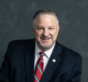 Richard Tyler, CEO and Forbes Business Council member, in a professional business portrait.