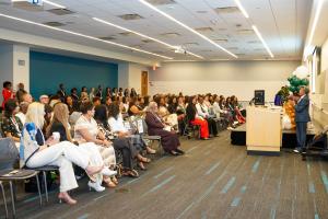 WOCRA CEO Kimberly Lee Minor welcomes attendees at the B.I.G. Summit. (Credit: PV Entertainment)