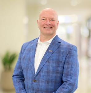 a headsho photo of John Dyck, CEO of CESMII