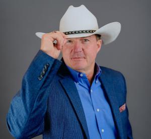 Tom Fulmer Tipping Cowboy Hat