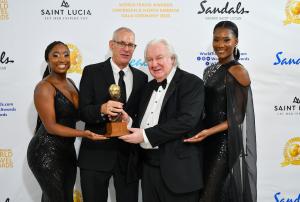 Matthew Beaubrun accepted the award on behalf of S Hotels Jamaica,  pictured with Graham Cooke, Founder of the World Travel Awards.