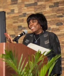 Ambassador Ertharin Cousin addresses the capacity audience at Meds & Food for Kids event that highlights local economic development and sustainable food systems