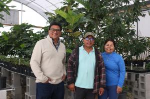 Everglades Farm owner Noah Aguilar with staff at the nursery in Homestead, Florida.