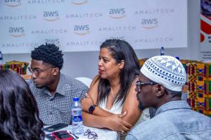 A group of people having a discussion at a networking event.