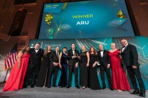 Photo of the the ARU team on stage accepting the MGA of the Year Award at Insurance Insider's awards ceremony in NYC.