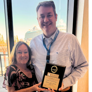 Ryan Ambs receiving CAM-X Award