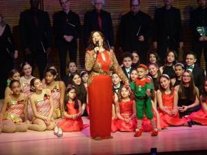 Cristina Fontanelli on-stage at Carnegie Hall with local children and youth