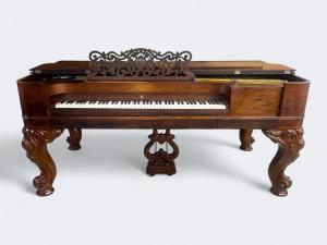 Steinway & Sons square grand piano in richly grained rosewood, serial #55083, dating to 1885, showcases the elegance of 19th century American piano making. Estimate: $1,000-$8,000.