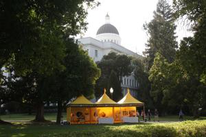 The bright yellow tent of the Scientology Volunteer Ministers at the State Capitol in Sacramento, California