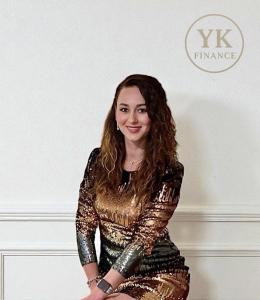 Portrait  of Yana Koliada, financial strategist and business leader developing innovative financial adaptation methodology in Alaska