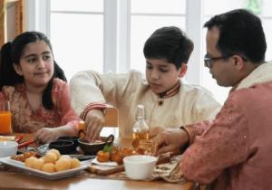 family eating butter chicken