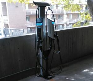 SemaConnect dual pedestal smart EV charging stations installed in a parking garage