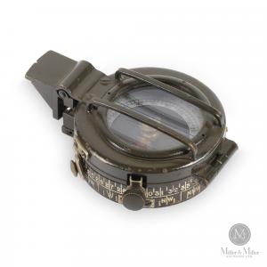 Canadian. C. 1943. Canadian Kodak Company Mk. IX prismatic compass. serial #9345C. Marked “CKC/C” for the Canadian Kodak Company. Estimate: CA$225-$325.