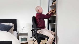 A VELA indoor mobility chair helps seniors and adults with disabilities stay active, independent, and engaged in daily home activities