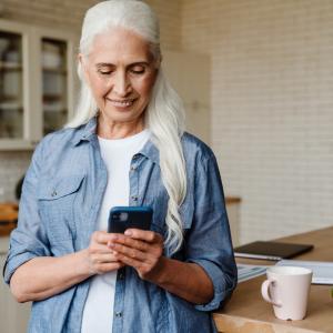 Resident on Phone in Kitchen