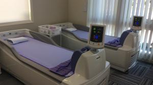Rows of Aquatizer Dry Hydro Jet Massage systems deployed across Japanese rehabilitation clinics illustrating MINATO Medical Science’s broad clinical adoption and scalable integration of dry hydro jet therapy in varied real-world therapeutic settings nationwide presence.