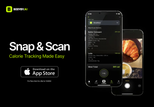 A smartphone displaying the Bodyby.AI app’s nutrition tracking feature, showing detailed calorie and macro breakdowns for a butter croissant and latte. The image headline reads “Snap & Scan – Calorie Tracking Made Easy,” with an App Store download button 