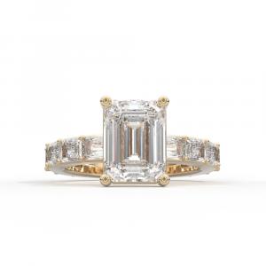 The Jewelers Coin & Loan Co. crafting a 4ct emerald-cut diamond ring in 18k yellow gold with petite claw prongs