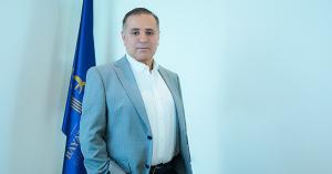 Sam Bayat, Esq., founder of Bayat Group and official MENA representative of VOCO Times Square, pictured in professional attire.