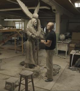 Timothy Schmalz in his studio sculpting