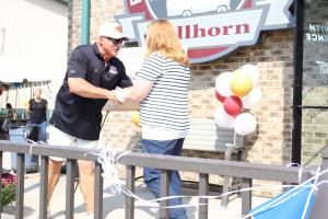 Doug Stellhorn, owner of Stellhorn RV & Camping Center in Kokomo, Indiana, presents a $5,000 donation check to the Kokomo Humane Society during the dealership’s community event supporting animal welfare.